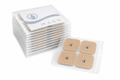 Stack of 10 sealed pouches each with 4 Osseus self-adhesive TENS electrode pads on white background