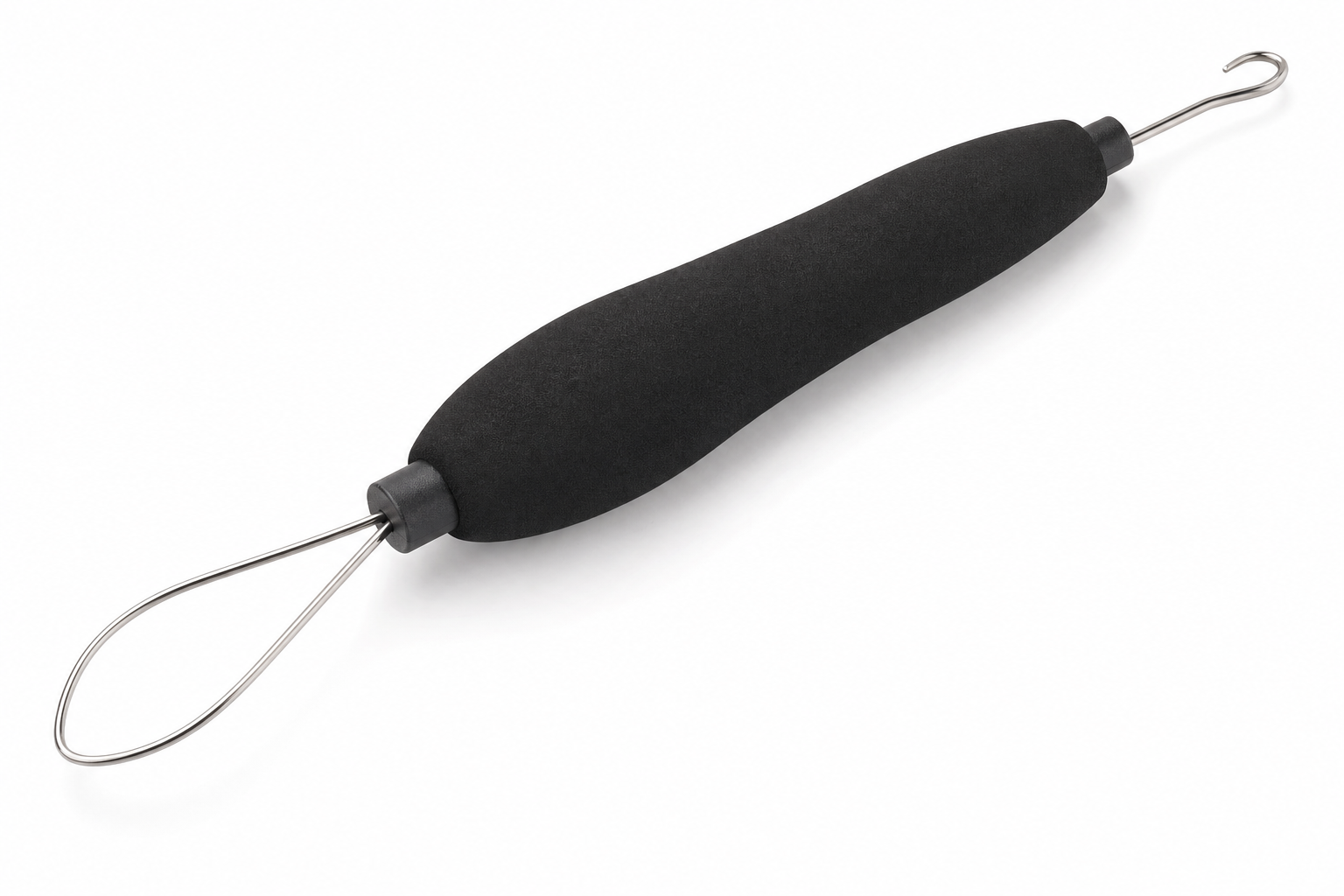 Combination button hook and zipper pull tool with black foam grip and metal wire loop on white background