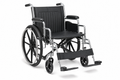 Folding manual wheelchair with chrome frame, black vinyl seat, large rear wheels and removable footrests on white background